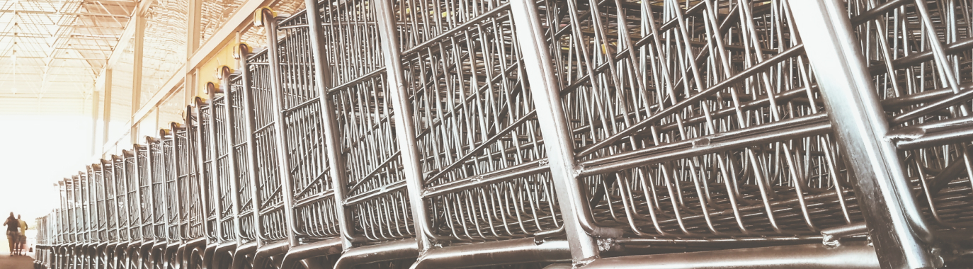 A line of connected shopping carts